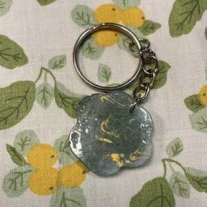 Elegant Silver Keychain with Gold Accents